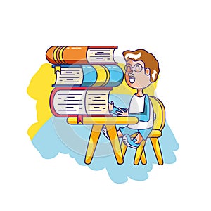 little student boy sitting in school desk with stack books
