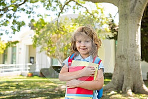 Little student going to school. Back to school. Happy child ready for primary school. Pupil on first day of classes.