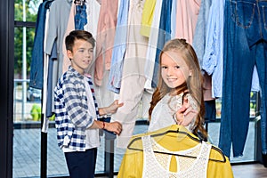 little stylish couple on shopping