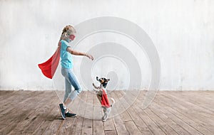 Little super girl with a dog