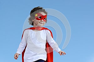 Little superhero child girl