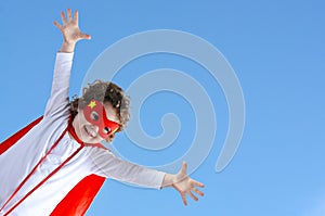 Little superhero child girl flies in air