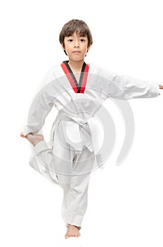 Little tae kwon do boy martial art warm up photo