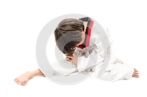 Little tae kwon do boy martial art warm up photo
