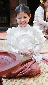 Little thai girl in a traditional costume