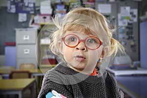 Little todder with glasses