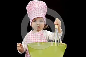 Little toddler cooking pastry