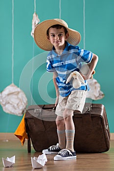 Little traveler with big valise