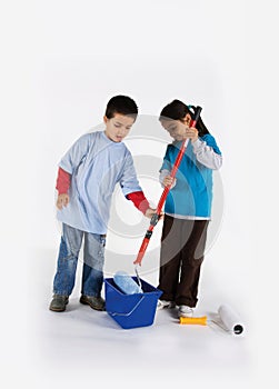 Little two workers with paint roller