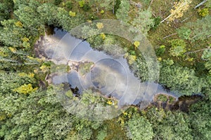 Little untouched forest lake aerial photo