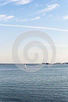 The little velero sailing under the sun photo