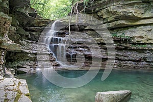 Little waterfall on a narrow creek