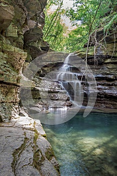 Little waterfall on a narrow creek