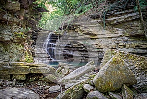 Little waterfall on a narrow creek