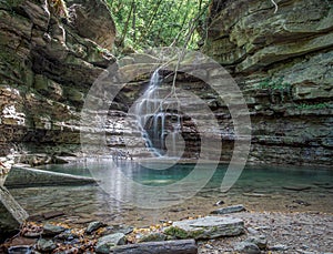 Little waterfall on a narrow creek in the Northern Apennines