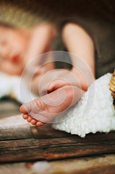 Little white feet of a newborn baby who sleeps