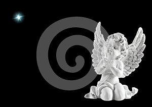 Little white guardian angel with star. Christmas decoration