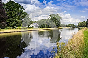 Little white house at the Noord-Willems canal in Drenthe