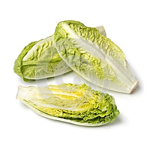 Little whole and halved fresh raw Romaine lettuce isoleted on white background