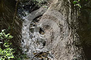 little wild river between rocks