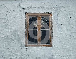 Little window on old mud house in Vojvodina Serbia