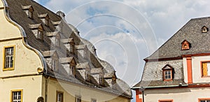 Little windows on the roof of the Burresheimer Hof building in Koblenz