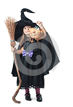 Little witch shows the collected candy