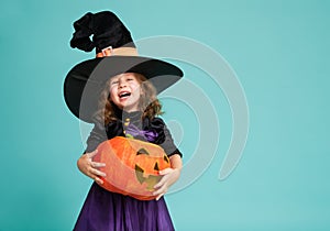 Little witch on turquoise background