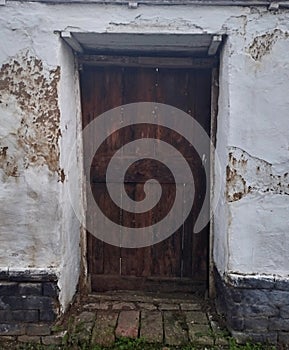 Little wooden doors on old mud house in Vojvodina Serbia