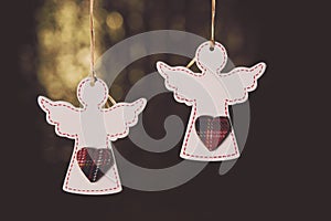 Little wooden white angels