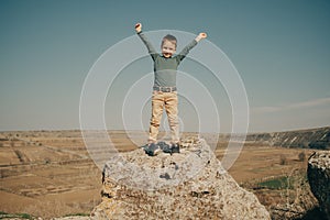 Little young caucasian boy in nature, childhood