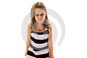 Little young girl is angry, mad, disobedient with bad behaviour.