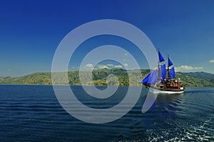 Live board Phinisi Bugis traditional boat cruise around Komodo Islands in Indonesia.