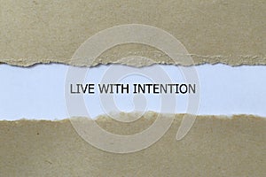 live with intention on white paper