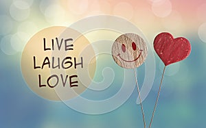 Live laugh love with heart and smile emoji