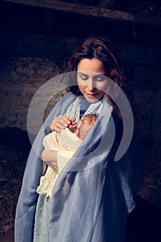 Live nativity scene with doll