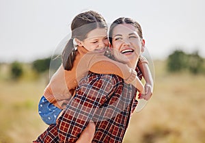 We live for the outdoors. a woman and her daughter spending time outside on their farm.