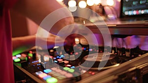 Live show, audio Mixer. Disco and Club DJ hands mixing at night club party. close up, move camera