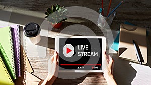 Live stream transmit or receive video and audio coverage over the Internet. Digital marketing and advertising concept. photo