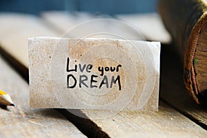 Live your dream. The inscription on the tag. Vintage style. Motivational quotes