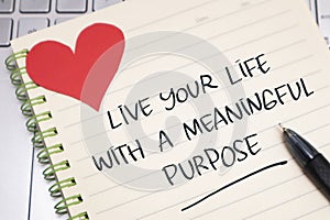 Live your life with meaningful purpose, text words typography written on paper, life and business motivational inspirational