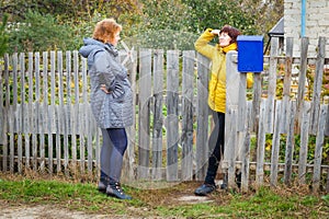 A lively conversation between two neighbors