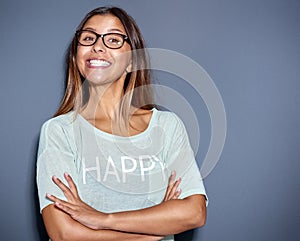 Lively young woman with a big cheesy grin