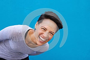 Lively young woman laughing photo