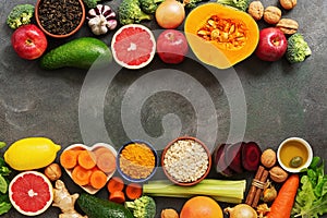 Liver detox diet food concept, border. Fruits,vegetables, nuts, olive oil, citrus fruits, green tea, turmeric, oats. Top view,