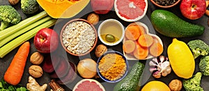 Liver detox diet food concept, fruits, vegetables, nuts, olive oil, garlic. Cleansing the body, healthy eating. Top view, flat lay