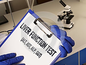 Liver function test (ALT, AST, ALP, GGT) is shown using the text photo