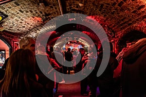 LIVERPOOL, ENGLAND, DECEMBER 27, 2018: People enjoying a pleasant time inside The Cavern Club, birthplace of the Beatles