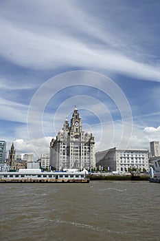 Liverpool, June 2014,  a scene across the River Mersey showing Pier Head, with the Royal Liver Building, Cunard Building and Port