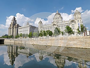The beautiful waterfront of the city of Liverpool with the Three Graces, England. photo
